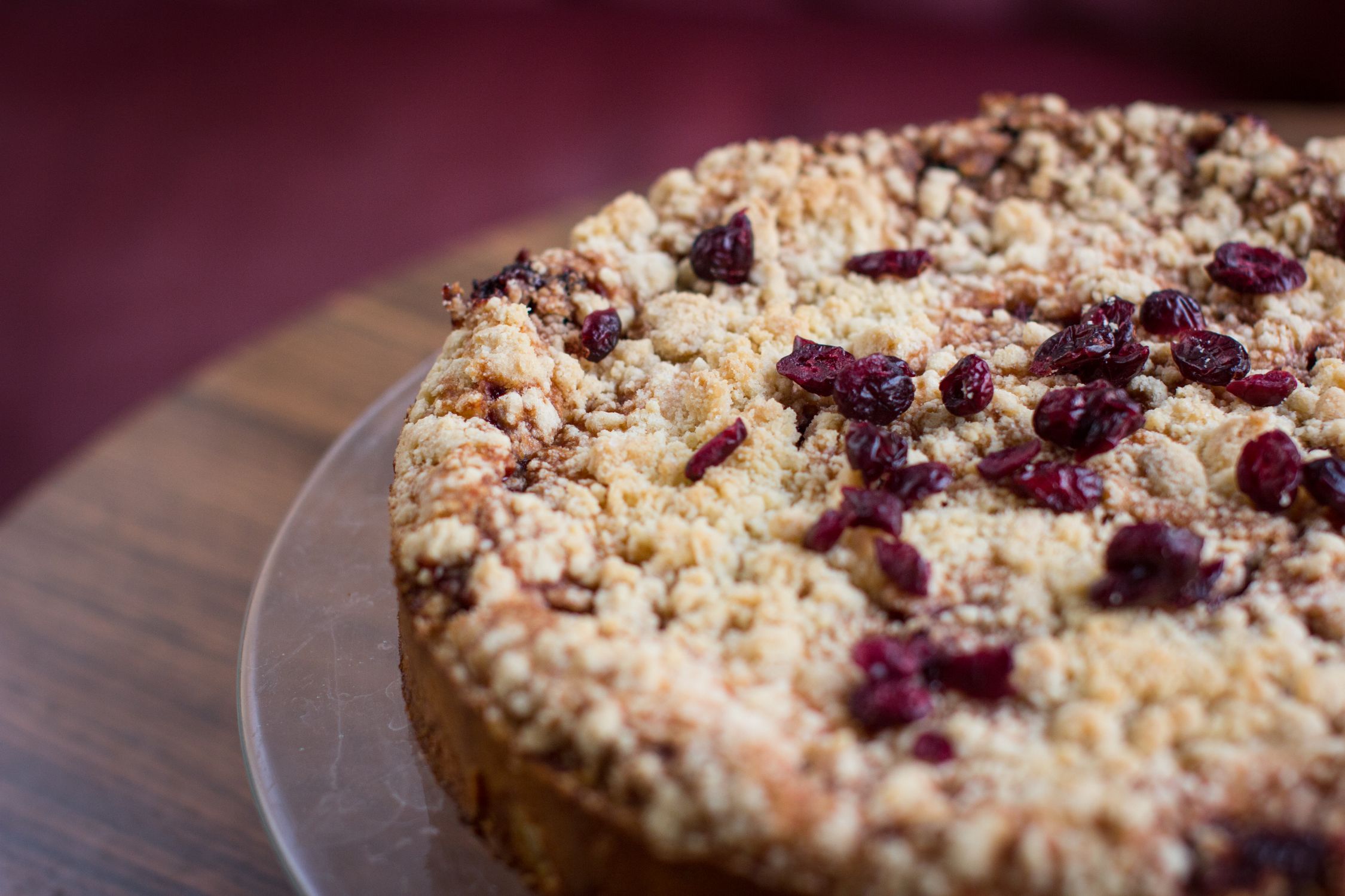 Homemade berry crumble on a wooden surface - British Berries Guide