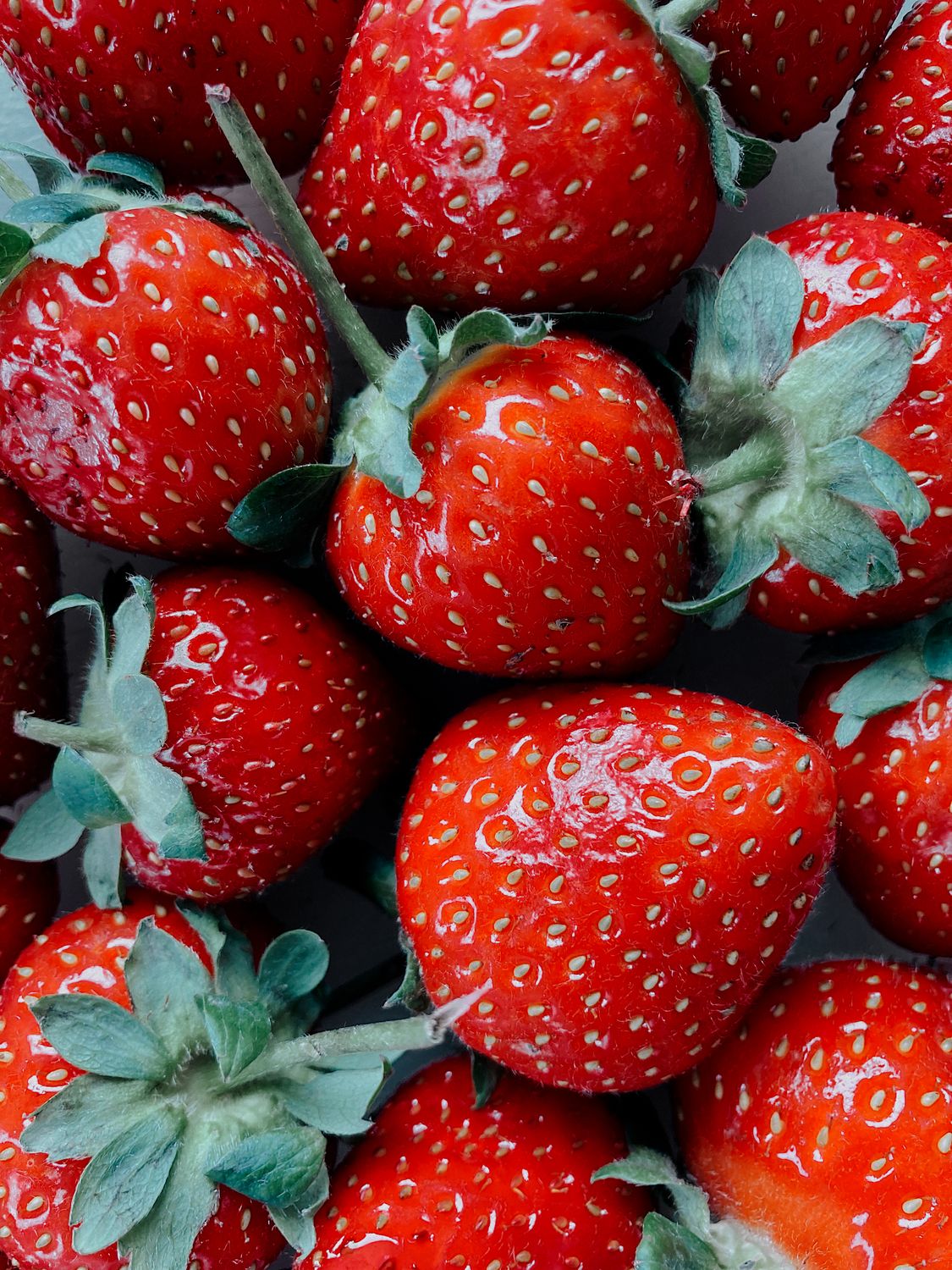 Beautiful large ripe red strawberry close-up